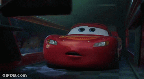 A Red Cartoon Car With The Number 55 On The Side Of It GIF