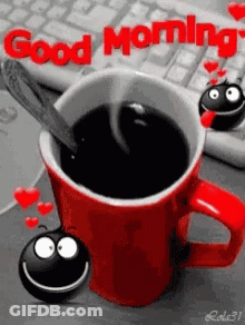 A Red Cup Of Coffee With A Spoon In It And The Words Good Morning Written On It GIF