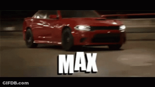 A Red Dodge Charger Is Driving On A Highway With The Word Max Written On The Bottom GIF