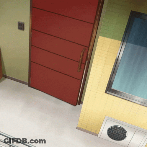 A Red Door Is Open To A Room With A Yellow Wall GIF