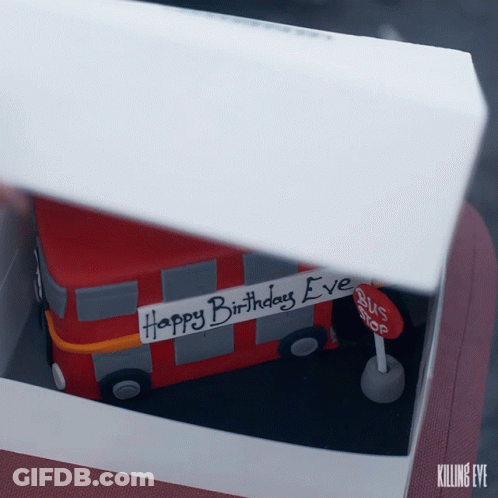 A Red Double Decker Bus With The Words Happy Birthday Eve Written On It GIF