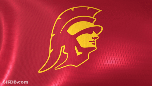 A Red Flag With A Yellow Logo Of A Spartan On It GIF