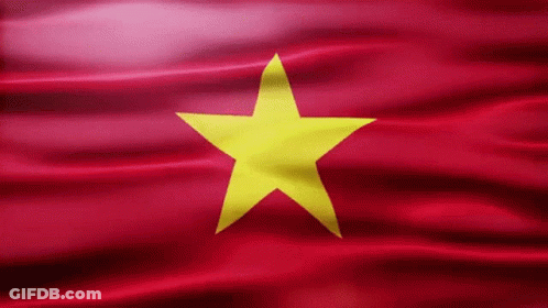 A Red Flag With A Yellow Star In The Middle GIF