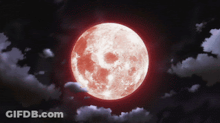 A Red Full Moon Is Surrounded By Clouds In The Night Sky GIF