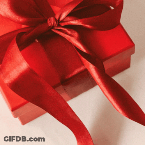 A Red Gift Box With A Red Bow GIF