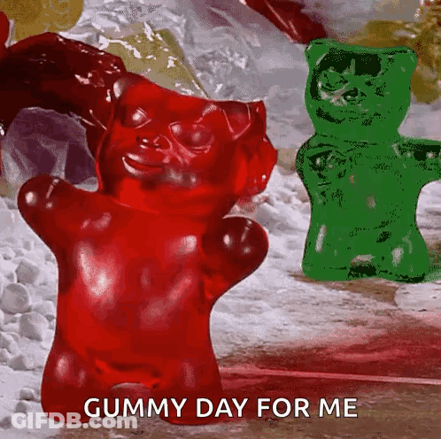 A Red Gummy Bear Is Standing Next To A Green Gummy Bear With The Words Gummy Day For Me Below It GIF