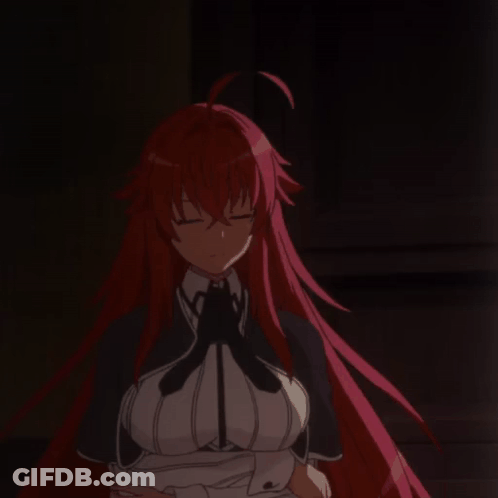 A Red Haired Anime Girl With Her Eyes Closed In The Dark GIF