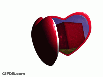 A Red Heart Shaped Box With A White Sticker That Says ' I Love You ' On It GIF