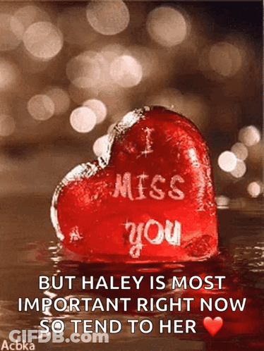 A Red Heart That Says I Miss You Is In The Water GIF