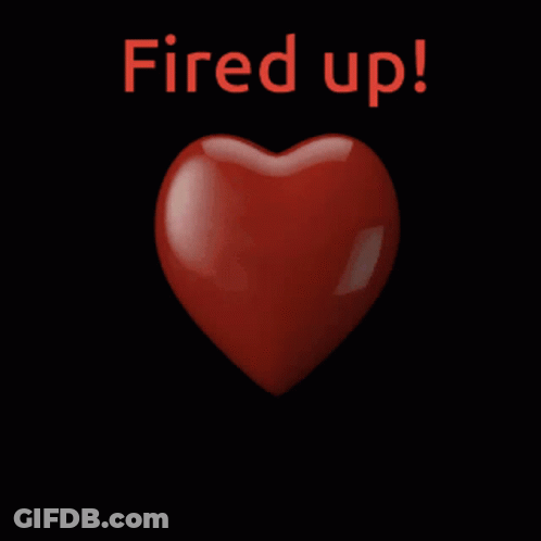 A Red Heart With The Words Fired Up Written Below It GIF