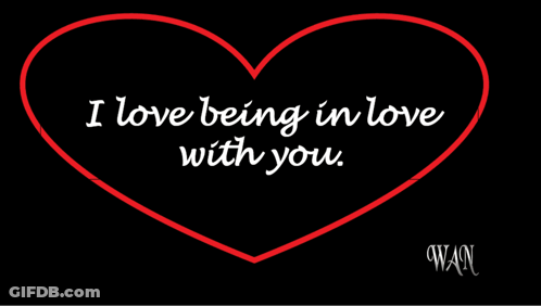 A Red Heart With The Words I Love Being In Love With You On It GIF
