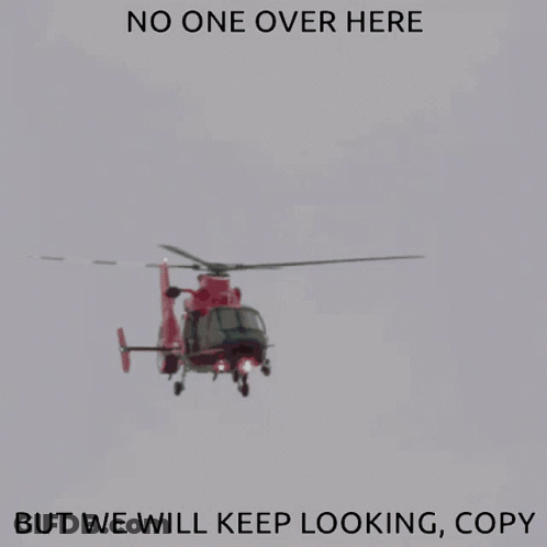 A Red Helicopter Is Flying In The Sky With The Words " No One Over Here But We Will Keep Looking Copy " GIF