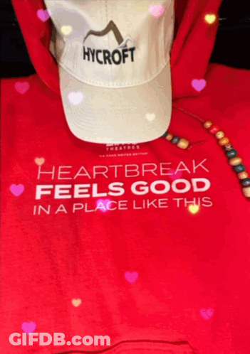 A Red Hoodie With The Words Heartbreak Feels Good In A Place Like This On It GIF