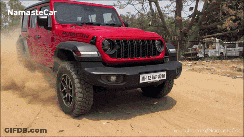 A Red Jeep With The License Plate Mh12wp8240 GIF