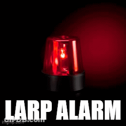 A Red Larp Alarm Is Lit Up On A Dark Background GIF