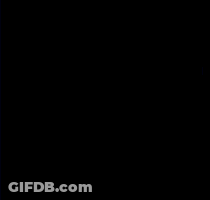 A Red Laser Beam Is Shining On A Black Background GIF