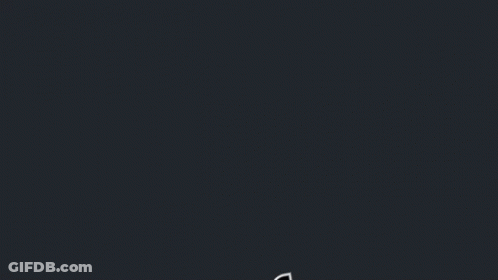 A Red Letter M Is On A Dark Background GIF