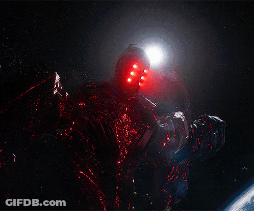 A Red Light Coming Out Of A Black Hole In Space GIF