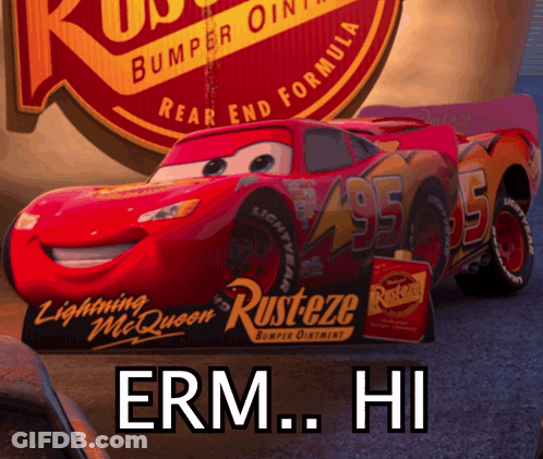A Red Lightning Mcqueen Car With Rusteze On The Side Of It GIF