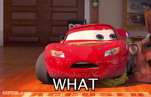 A Red Lightning Mcqueen From The Movie Cars Is Sitting On The Floor GIF