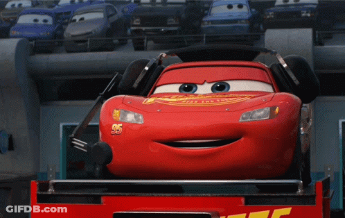 A Red Lightning Mcqueen From The Movie Cars Is Smiling GIF