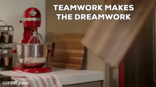 A Red Mixer Is Sitting On A Kitchen Counter With The Words Teamwork Makes The Dreamwork Written Above It GIF