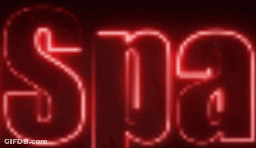A Red Neon Sign That Says Spa On It GIF
