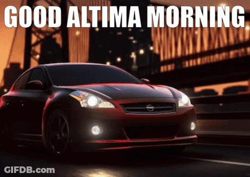 A Red Nissan Altima Is Driving Down A Street GIF