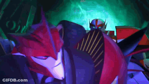 A Red Robot Is Sitting In A Dark Room With A Purple Background GIF