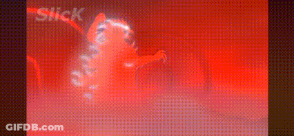 A Red Screen With The Word Slick On It . GIF