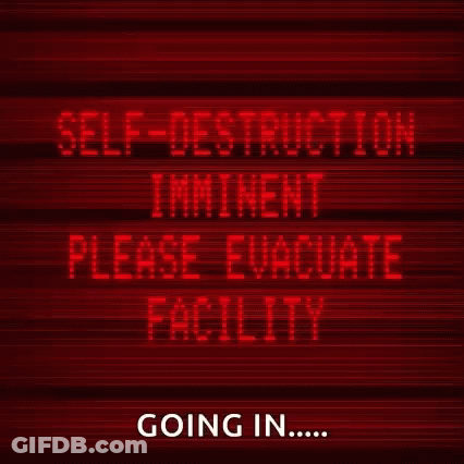 A Red Sign Says Self-Destruction Imminent Please Evacuate Facility Going In GIF