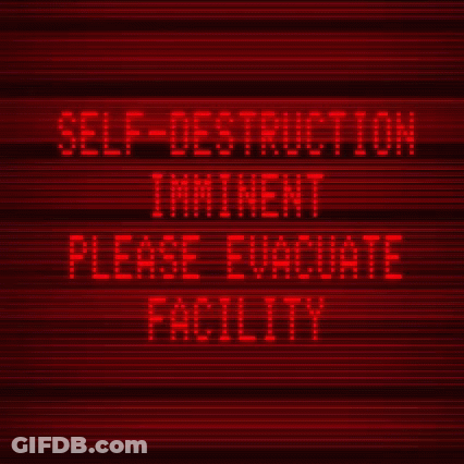 A Red Sign Says Self Destruction Imminent Please Evacuate Facility GIF