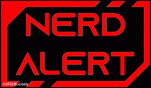 A Red Sign That Says Nerd Alert On It GIF