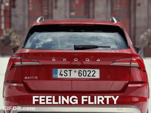 A Red Skoda With A License Plate That Says 4St6022 GIF