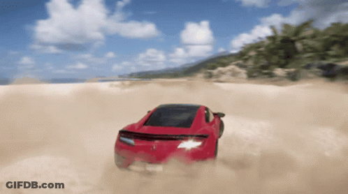 A Red Sports Car Is Driving Through A Sandy Desert GIF