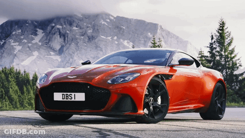 A Red Sports Car With A License Plate That Says Dbsi GIF