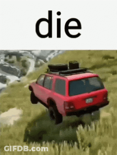A Red Suv Is Driving Down A Grassy Hill With The Word Die On The Bottom . GIF