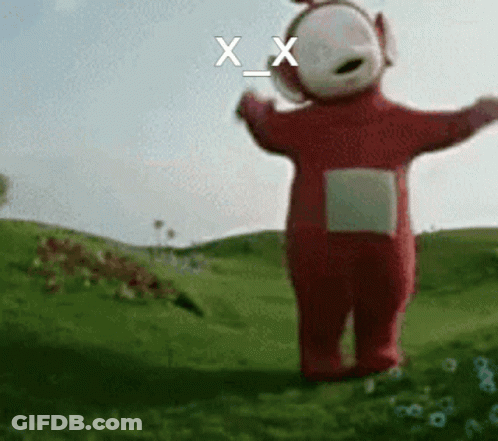A Red Teletubbies Character Is Standing In A Grassy Field GIF