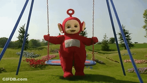 A Red Teletubbies Character Is Swinging On A Blue Swing GIF