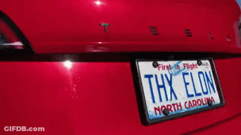 A Red Tesla Has A North Carolina License Plate GIF