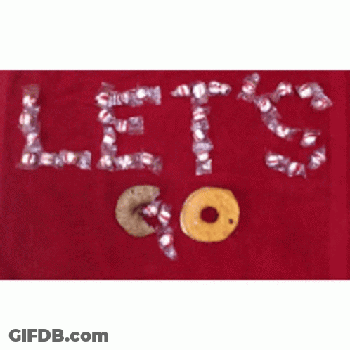 A Red Towel With The Words Let 'S Go Written In Candy GIF