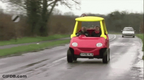 A Red Toy Car With A Yellow Top Has A License Plate That Says X416 Hlb GIF