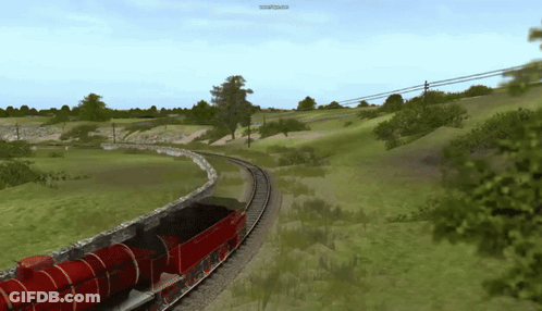A Red Train Is Going Down The Tracks With A Screen That Says Www.youtube.com GIF