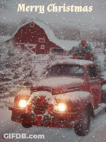 A Red Truck With A Christmas Tree On Top Of It And The Words Merry Christmas Above It GIF