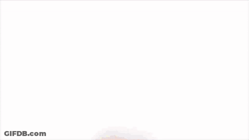 A Red Uno Card With Two White Arrows Pointing In Opposite Directions On It . GIF