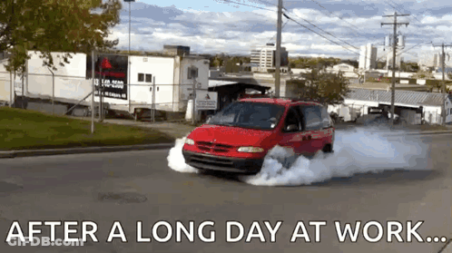 A Red Van Is Driving Down A Street With Smoke Coming Out Of The Tires And The Words After A Long Day At Work Below It GIF