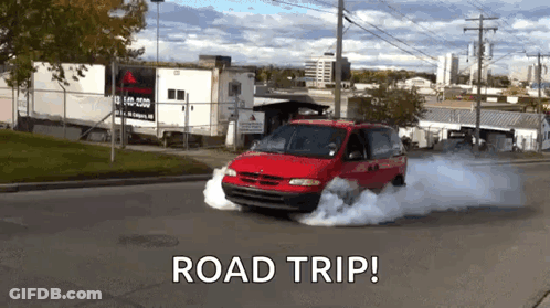 A Red Van Is Driving Down A Street With Smoke Coming Out Of The Tires And The Words Road Trip Written On The Bottom GIF