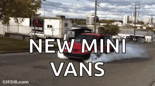 A Red Van Is Driving Down A Street With The Words " New Mini Vans " Written On The Bottom GIF