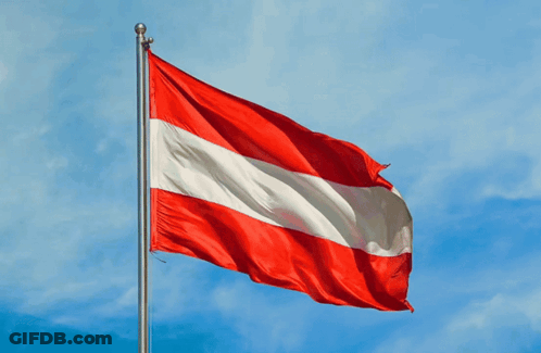 A Red White And Blue Flag With A Blue Sky In The Background GIF