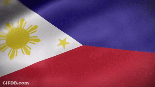 A Red White And Blue Flag With A Yellow Sun And Star On It GIF